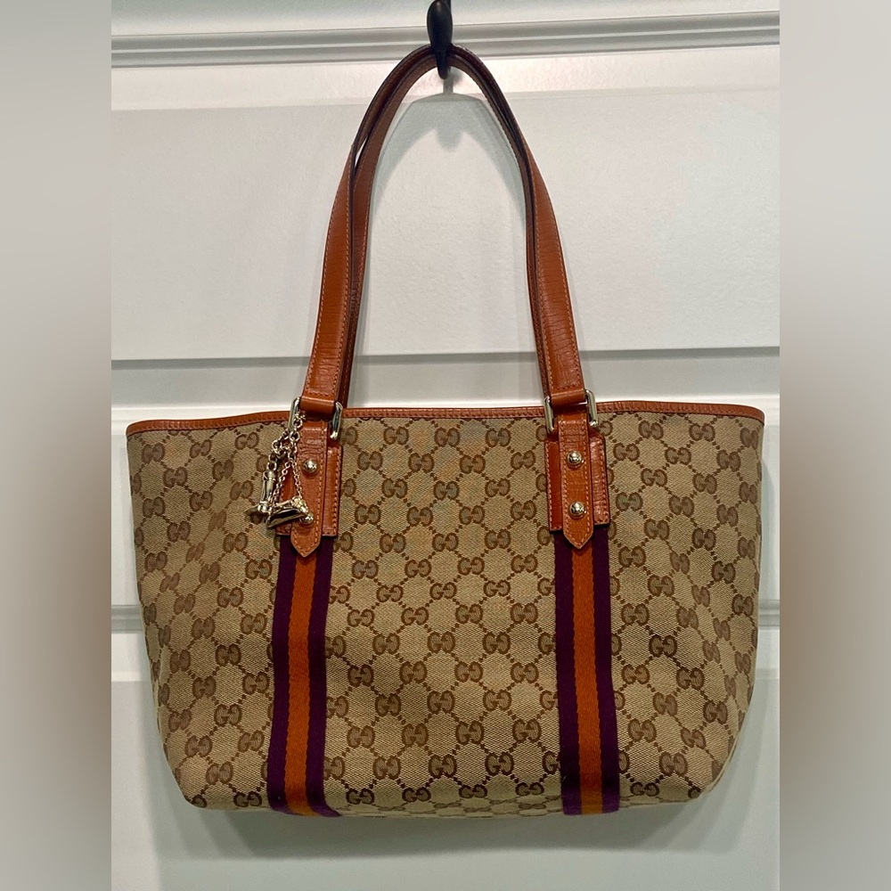 AUTHENTIC GUCCI GG Canvas Med. Jolicoeur Tote with Gucci charm & Purple lining.